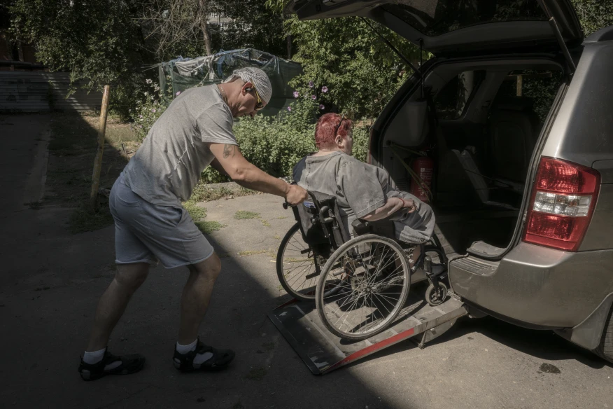 Keeping Kherson moving: A social taxi provides a vital connection in a city under attack